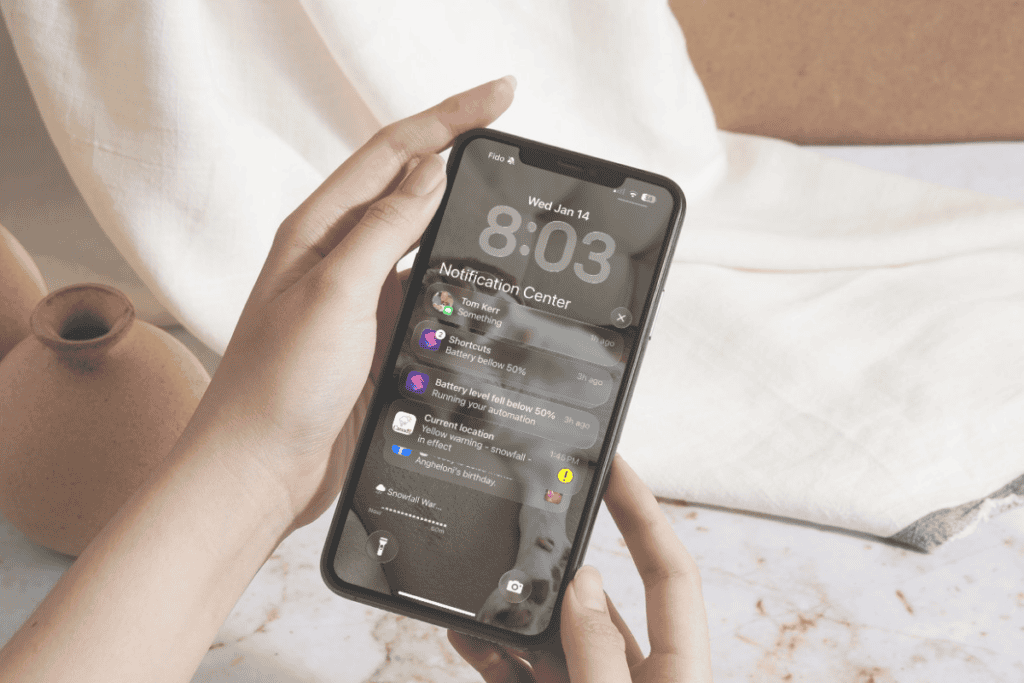 iPhone showing the notification center and notifications.
